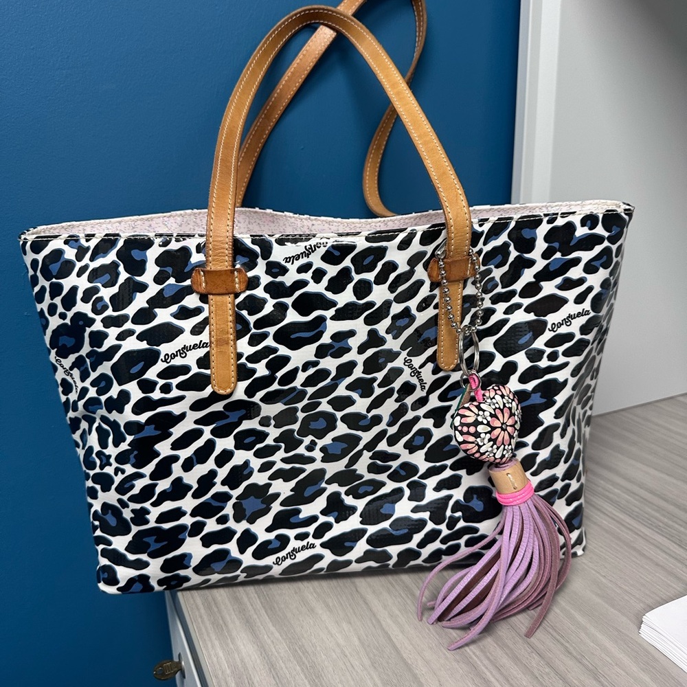 Consuela White and Navy Leopard Tote with Tan Handles and Pink Tassel